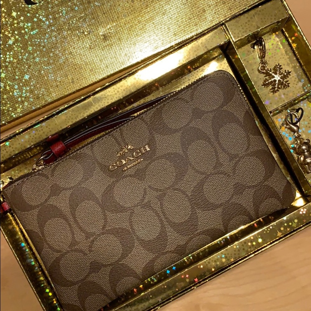 Coach Wristlet with Charms